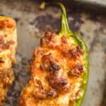 stuffed sausage jalapeño recipe on a baking sheet