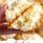 close up of a coconut macaroon with condensed milk broken in half