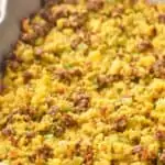 close up of a baking dish full of cornbread sausage stuffing