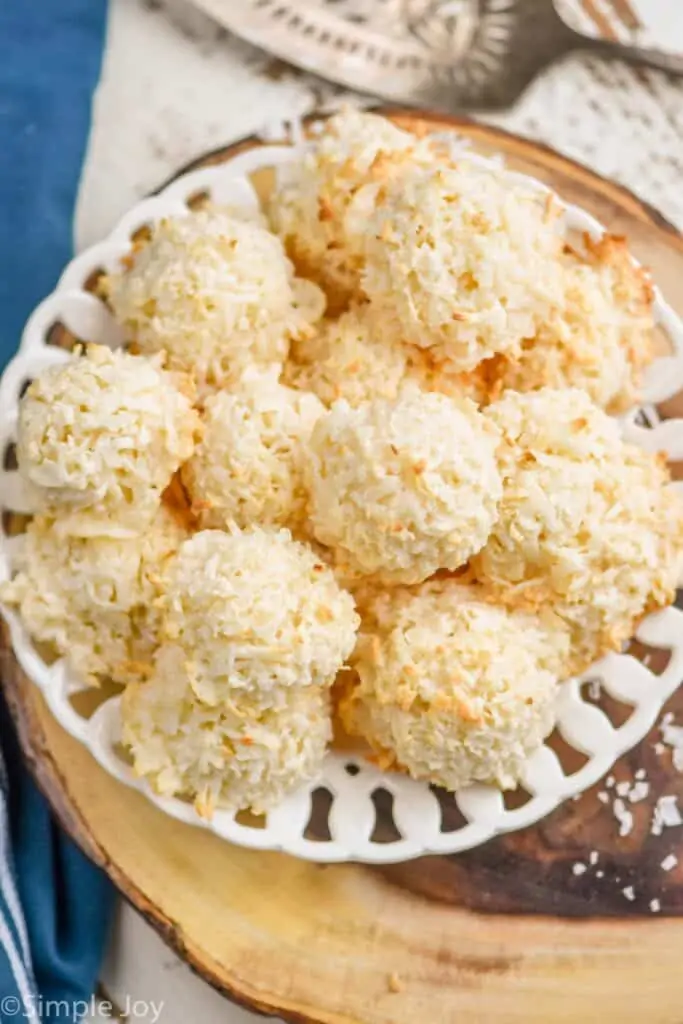 overhead view of a white plate full of coconut macaroon cookies