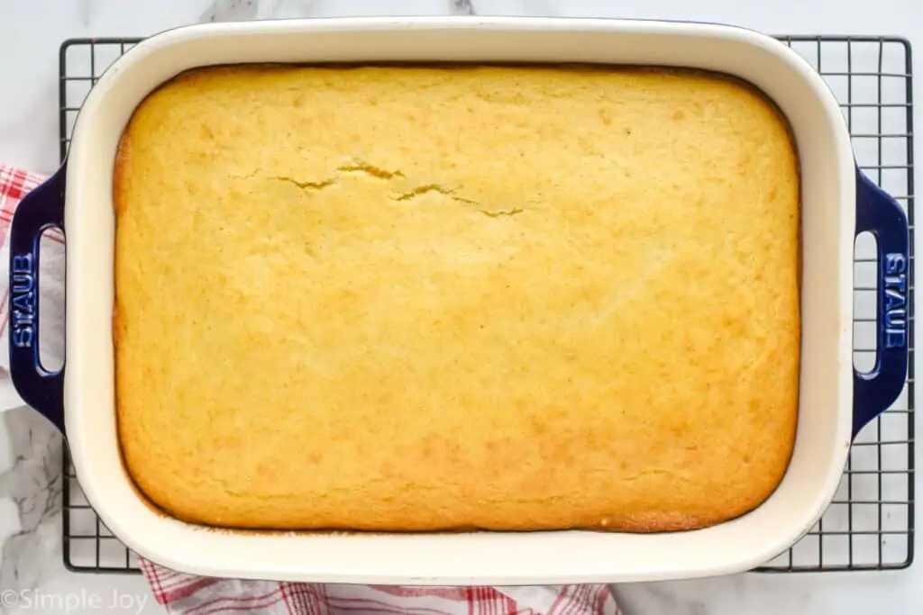 overhead picture of easy cornbread recipe in a baking dish on a cooling wrack