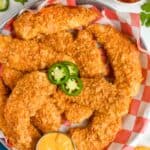 overhead view of a basket of chicken tenders made with crushed chips - 6