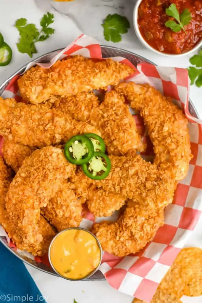 overhead view of a basket of chicken tenders made with crushed chips