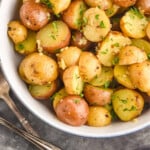 pinterest graphic of overhead of a bowl of roasted potatoes, says "super easy roasted potatoes simplejoy.com"