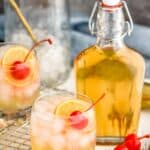 two glasses of amaretto sour with homemade amaretto liqueur - 11