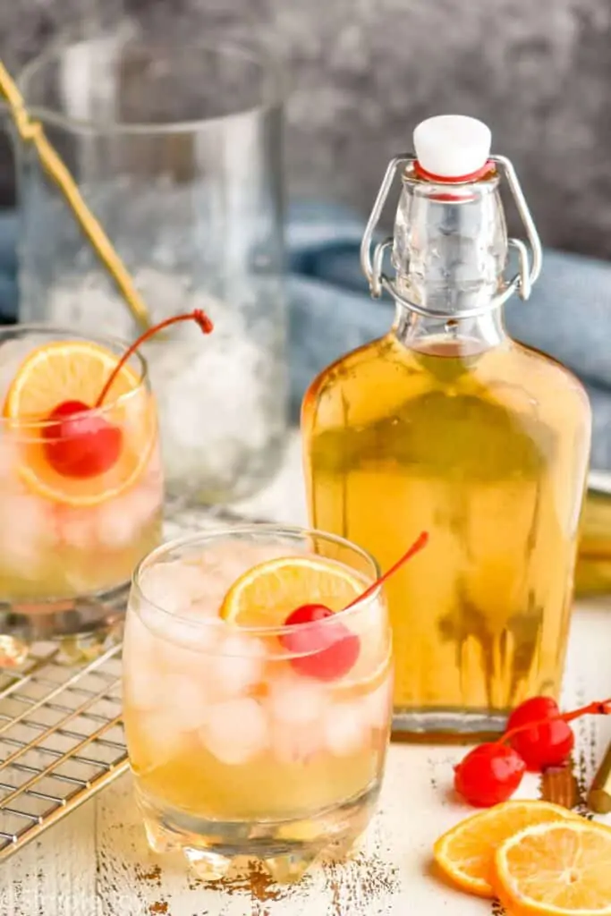 two glasses of amaretto sour with homemade amaretto liqueur