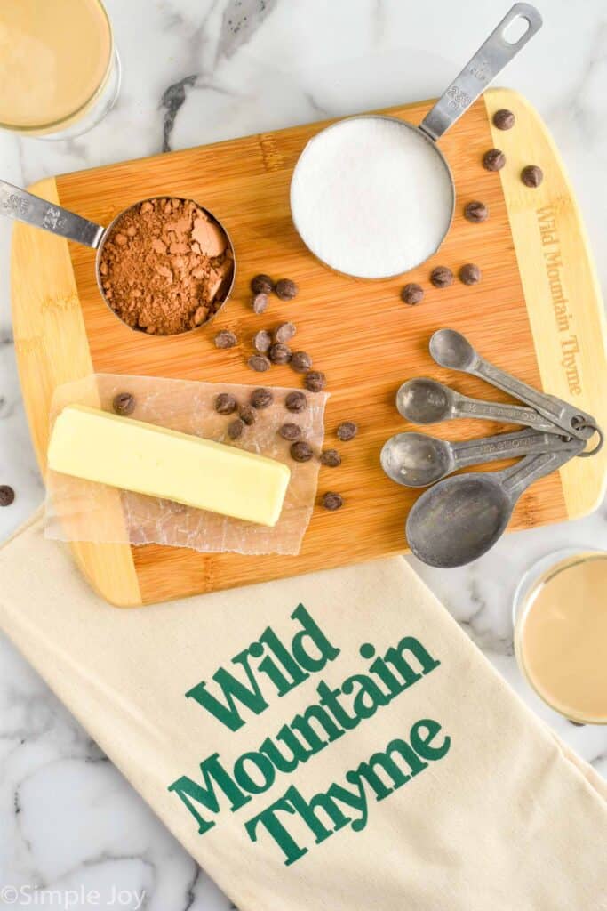 ingredients for baileys brownies on a wooden cutting board