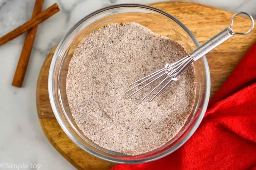 overhead view of sugar cinnamon mixture to use on candied walnuts