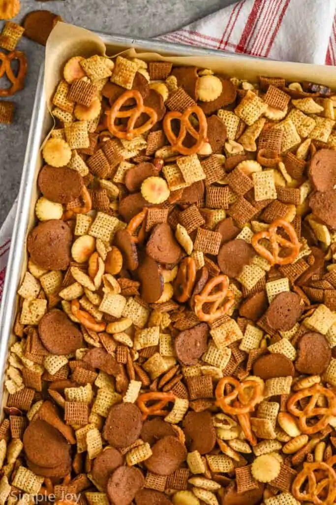 overhead view of a baking sheet of Chex mix recipe you make in the oven