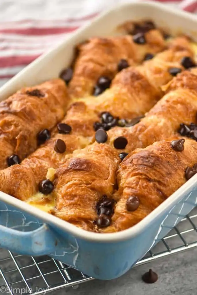 casserole dish holding chocolate croissant bread pudding recipe