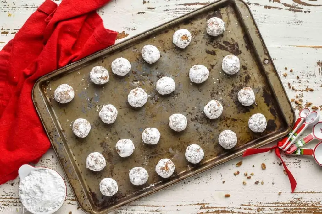 overhead photo of rum balls on a baking sheet