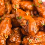 up close of a buffalo chicken wing as pinterest graphic