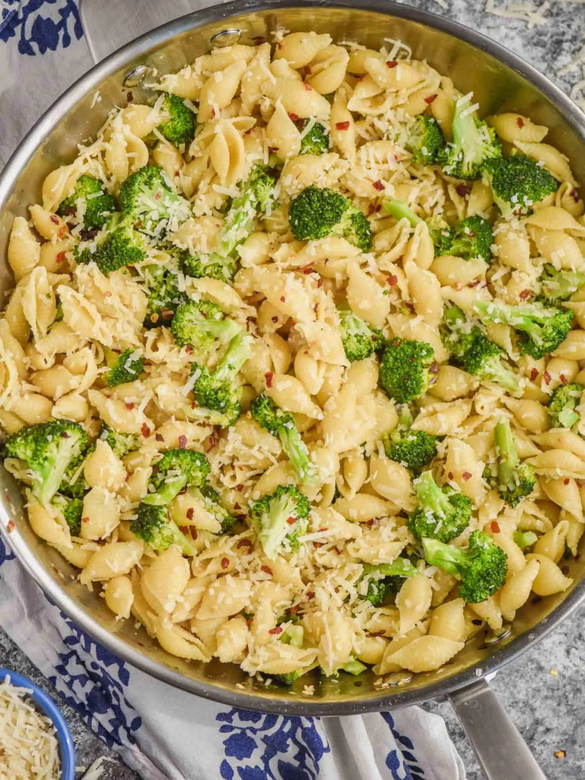 overhead view of skillet full of broccoli pasta