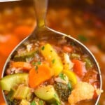 pinterst graphic of a ladle full of vegetable soup, says: "instant pot vegetable soup, simplejoy.com"