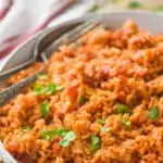 pinterest graphic with bowl of Spanish rice