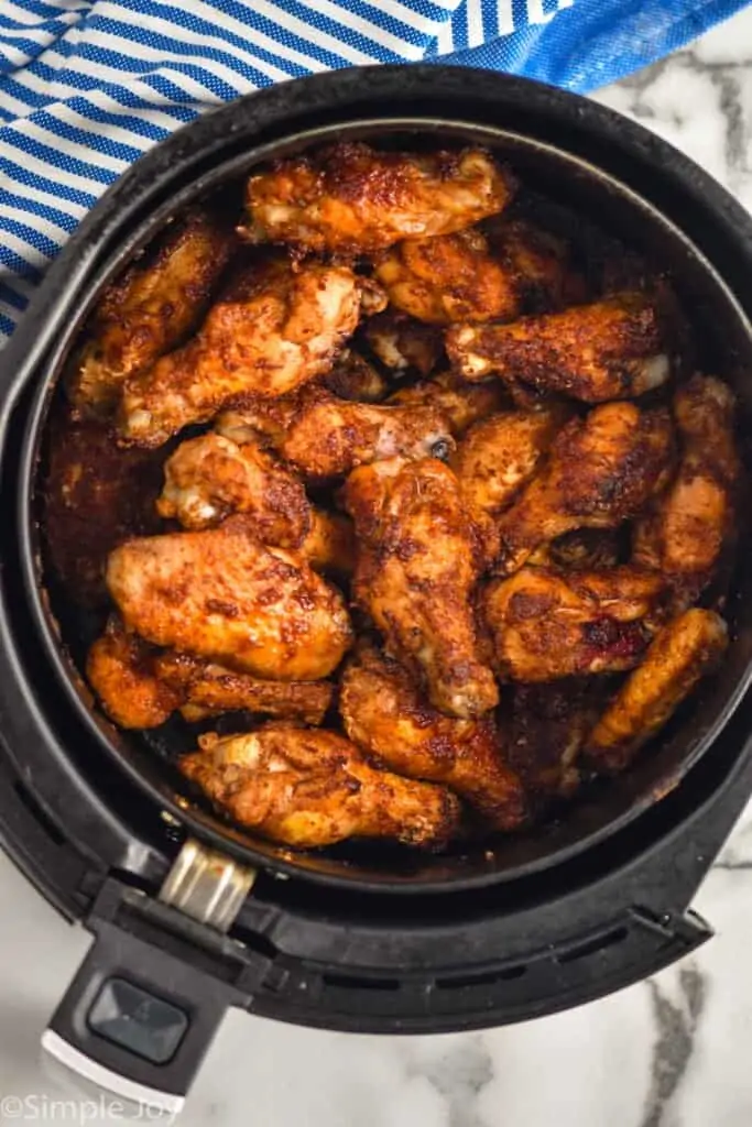 overhead view of chicken wings in air fryer