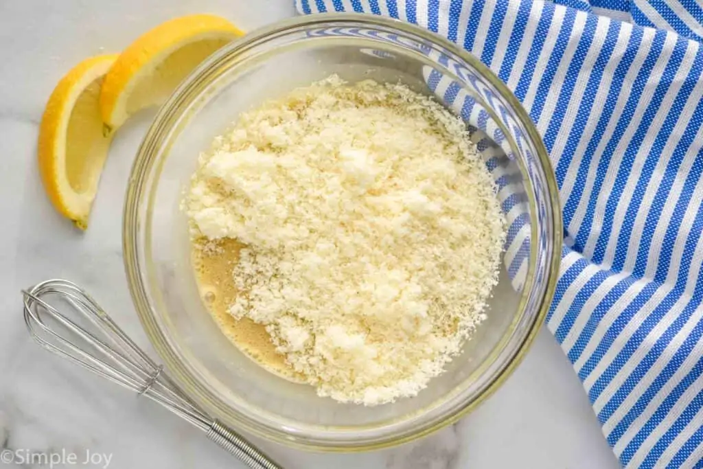 bowl of Caesar salad dressing before the finely grated Parmesan cheese has been mixed in