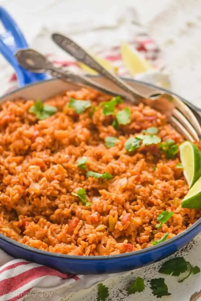 side view of a skillet full of Spanish rice