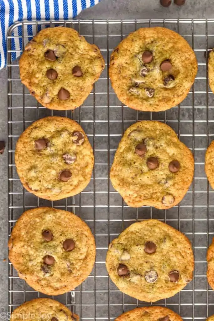 overhead view of six banana chocolate chip cookies on a cooling rack