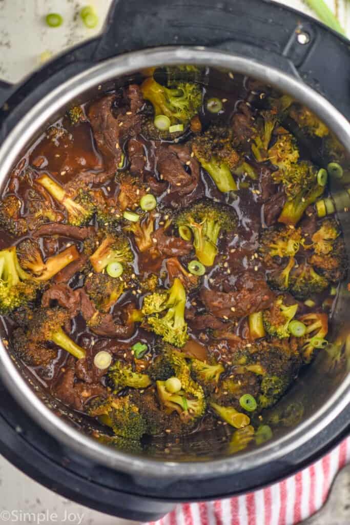 aerial view of an instant pot full of meat and broccoli