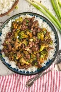 overhead view of a bowl of beef and broccoli made in the instant pot over rice