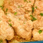 pinerest graphic overhead image of a close up piece of baked sour cream chicken