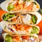stack of buffalo chicken warps that are stacked on top of each other and cut in half - 16