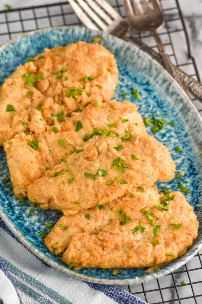 platter full of baked sour cream chicken
