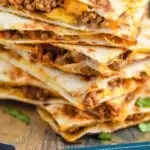 pinterest graphic of stack of beef quesadillas