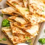 pinterest graphic of beef quesadillas on a platter