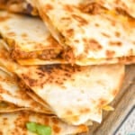 Pinterest graphic of beef quesadillas on a platter