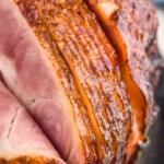 pinterest graphic of close up picture of a spiral cut ham recipe