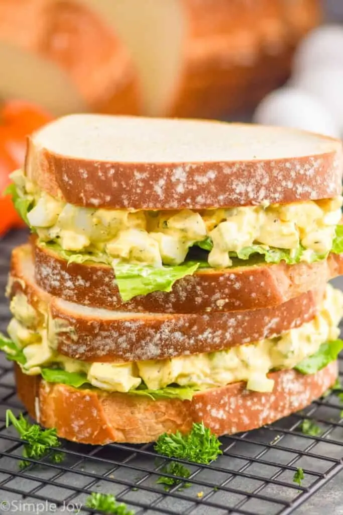two egg salad sandwich recipes stacked on top of each other