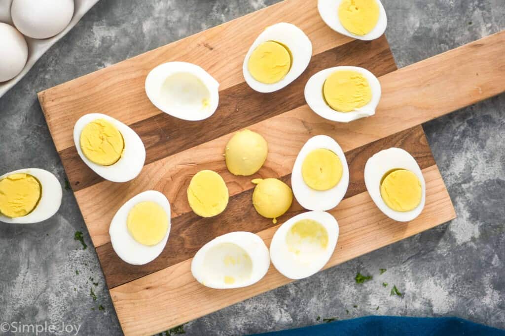 overhead picture of hard boiled eggs that are cut in half