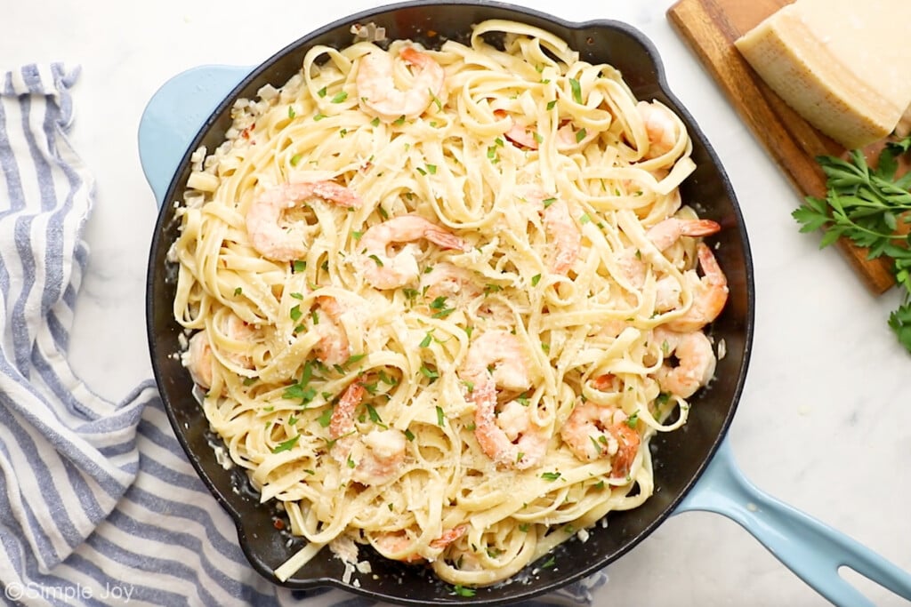 Overhead of skillet of shrimp pasta - 8
