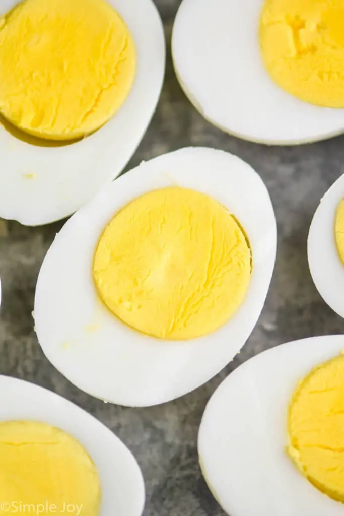 close up picture of a hard boiled egg cut in half