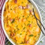 overhead view of a casserole dish with scalloped potatoes and ham