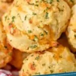 pinterest graphic close up of a cheddar bay biscuit