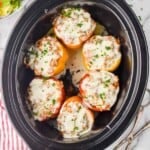 overhead photo of six stuffed peppers in a crockpot - 19
