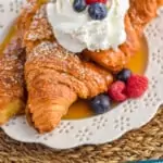 pinterest graphic of croissant French toast topped with whipped cream and berries
