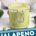 pinterest graphic of a small jar of jalapeno ranch dressing with a spoon dripping more over it