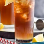 Pinterest graphic with a high ball glass filled with ice and Long Island iced tea