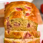 pinterest graphic of strawberry banana bread of it on a cutting board, says: the best strawberry banana bread simplejoy.com