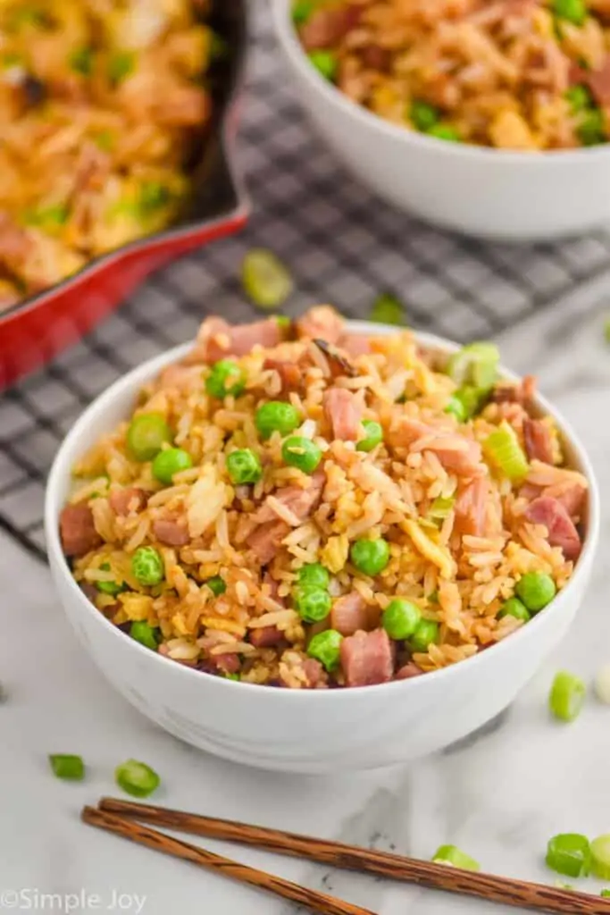 a small white bowl full of a fried rice recipe