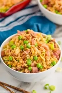 close up of a white bowl full of ham fried rice recipe