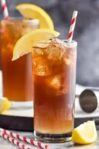 a high ball glass filled with ice and Long Island iced tea