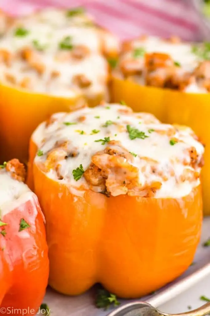 up close picture of an orange stuffed pepper