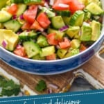 pinterest graphic of bowl full of cucumber tomato avocado salad