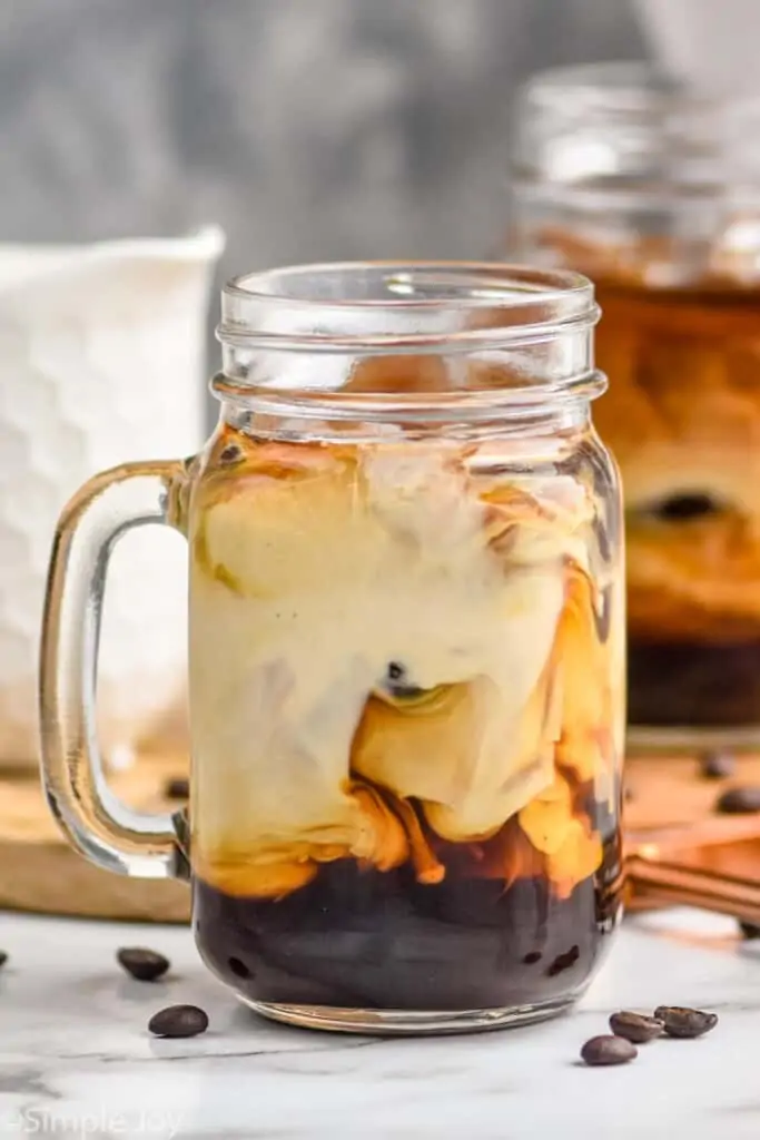 close up of a mason jar mug of iced coffee