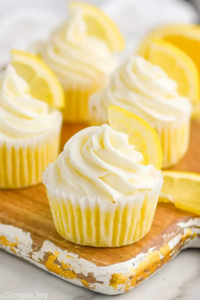 close up of lemon cupcakes on a tray